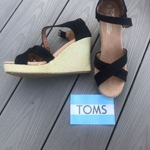 Toms. Black wedge.